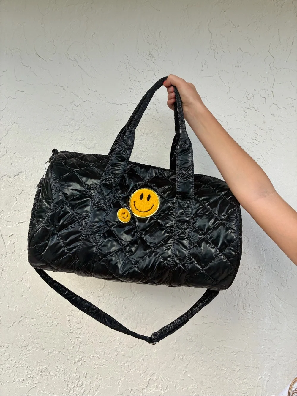 Black Quilted Duffel Bag with Smiley Patch